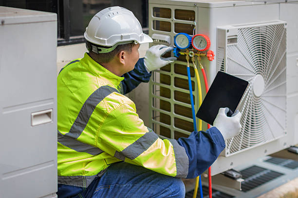 Professional Hvac technician working in Montchanin, DE